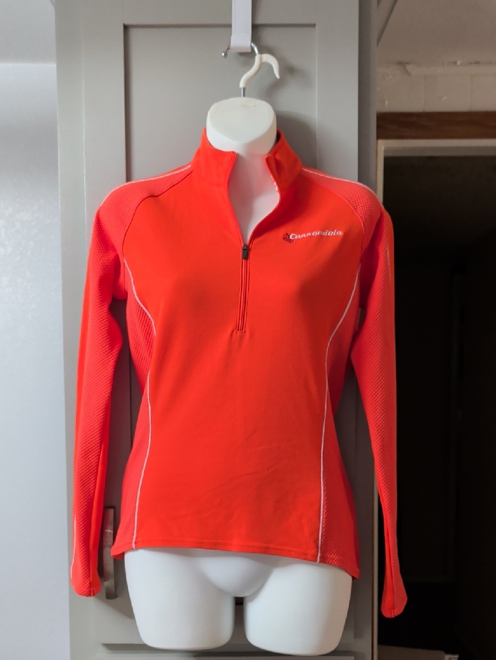 Cannondale Women's Long-Sleeve 1/4 Zip Top in Bright Coral Cycling Top